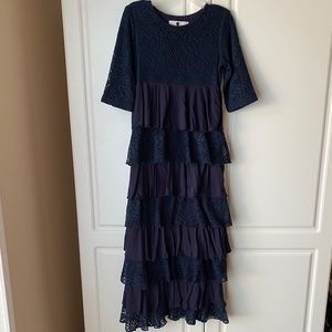 Dainty Jewell’s navy blue lace ruffle dress